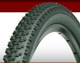 Geax Saguaro: A close-up image of a black bicycle tire featuring a knobby tread pattern, suitable for off-road terrain, set against a simple red and white background.
