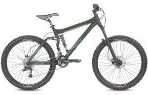 Giant AC: A green mountain bike with a sturdy frame, front suspension, and thick tires suitable for rugged terrain.
