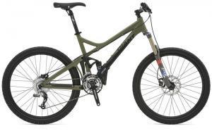 Giant Reign 1: A green mountain bike with a lightweight frame, front suspension, and disc brakes, positioned on a white background.