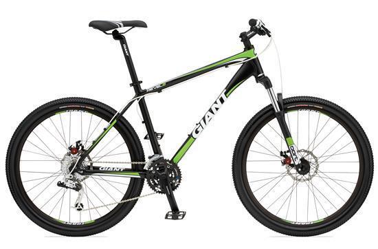 Giant Revel 0: A black and green mountain bike with the brand name "Giant" prominently displayed. The bike features a lightweight frame, disc brakes, and thick tires suitable for off-road riding.