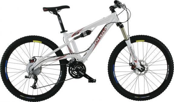 Haro Shift R5: Alt text: A white mountain bike with a dual suspension frame, equipped with wide tires and disc brakes, showcased on a plain background.