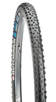 Hutchinson Toro: A close-up view of a Hutchinson bicycle tire, featuring a rugged tread pattern designed for off-road cycling. The tire is displayed at an angle to showcase its profile and the brand logo.