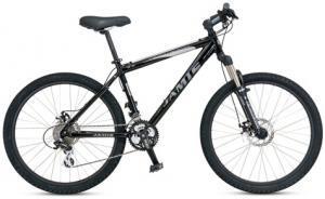 Jamis Cross Country 2.0: A black mountain bike with a sturdy frame, front suspension, and thick tires, positioned upright against a white background.