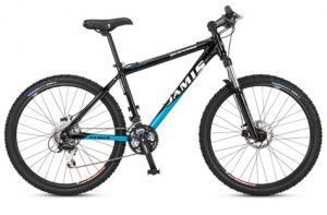 Jamis Durango 1.0: A black and blue mountain bike with a sleek frame, featuring thick tires, a comfortable saddle, and front suspension. The bike is standing upright on a plain background.