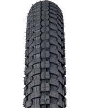 Kenda K-Rad: Close-up view of a black tire showcasing a detailed tread pattern designed for traction and durability.