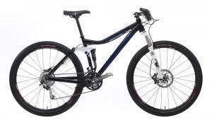 Kona Hei Hei 2-9: A modern mountain bike featuring a sleek black and white design, equipped with disc brakes and front suspension, positioned on a plain background.