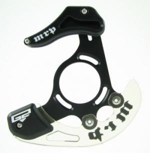 MRP G2: A black bicycle chain guide with a transparent plastic plate, featuring the brand name "MRP" and the letters "G2" on its design. The guide has an open center and several attachment points for installation on a bicycle frame.