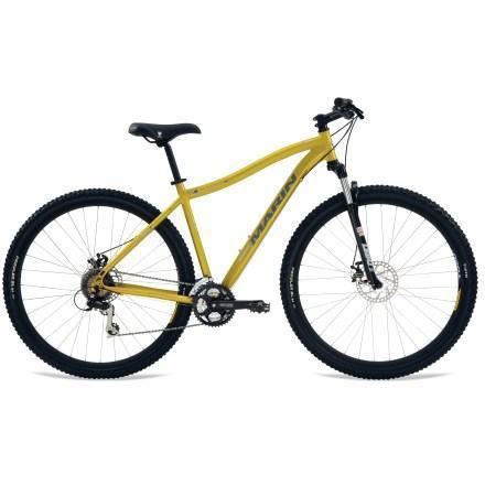 Marin Alpine Trail 29er: A yellow mountain bike with a sleek frame, featuring a front suspension fork, disc brakes, and knobby tires, positioned against a plain background.
