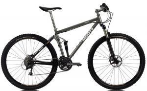 Moots Mooto XZ: A gray mountain bike with thick tires, front suspension, and a minimalist design, displayed from the side.