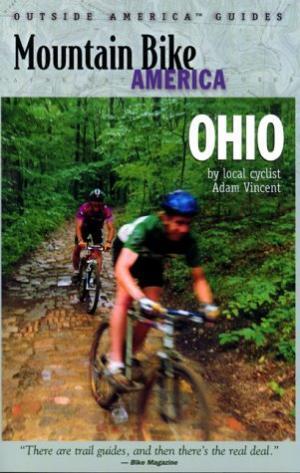 * Mountain Bike America: Ohio: Cover image of the book "Mountain Bike America: Ohio." The cover features two cyclists riding on a wooded trail. The background is lush with green trees, and the title and author