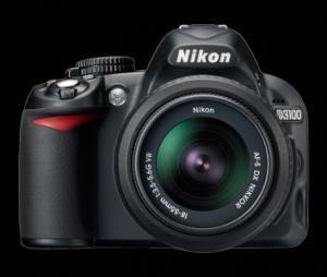 Nikon D3100 SLR: Black Nikon digital camera model D3100 with an 18-55mm lens, displayed against a black background.