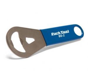 Park Bottle Opener: A blue and silver bicycle tool designed for removing and installing bottom bracket cups, labeled "Park Tool BO-2." The tool features a curved handle for grip and a dual-ended design with different sized openings for compatibility with various bottom brackets.