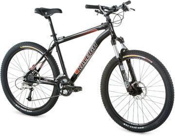 Raleigh Mojave 8.0: A black mountain bike with silver and red accents, featuring thick tires, a sturdy frame, and front suspension.