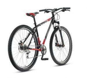 Redline D600: A black and red mountain bike with large, knobby tires, designed for off-road cycling. The bike features a sturdy frame, front suspension, and gear system, with a prominent seat and handlebars.