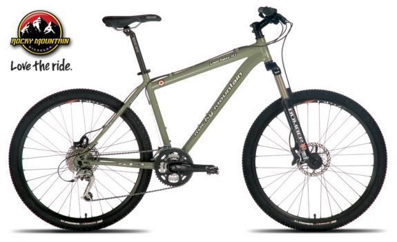 Rocky Mountain Vertex 10: Alt text: A green Rocky Mountain mountain bike is showcased on a white background. The bike features wide tires, disc brakes, and a sleek frame design, accompanied by the brand logo and the tagline "Love the ride."