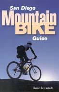 * San Diego Mountain Bike Guide: A book cover for "San Diego Mountain Bike Guide" featuring a silhouette of a mountain biker against a gradient sky, with text prominently displaying the title and author