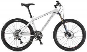 Santa Cruz Chameleon: A white mountain bike with wide tires, a front suspension fork, and disc brakes, positioned against a plain background.