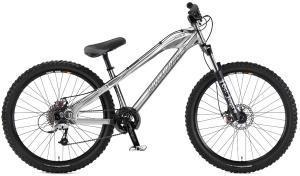 Santa Cruz Jackal: A silver mountain bike with large, knobby tires, a sturdy frame, and a single gear shifter. The bike features a comfortable seat and front disc brake, designed for off-road riding.