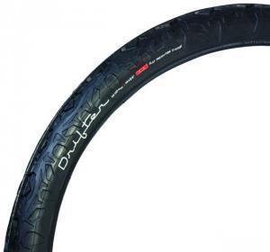 Serfas Drifter: Close-up of a black bicycle tire showcasing its tread pattern and sidewall markings, indicating the brand and model. The tire is designed for durability and performance on various terrains.