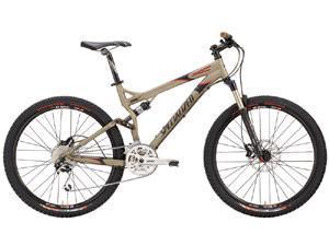 Specialized FSRxc Pro: A mountain bike with a lightweight frame, front suspension, and thick tires, designed for off-road riding. The bike features a sleek design with a gold and black color scheme, along with red accents on the wheels.