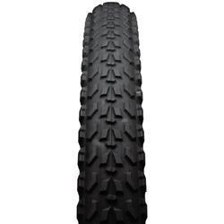 Specialized Fast Trak LK Pro: A close-up view of a black bicycle tire, showcasing its tread pattern with prominent angular knobs designed for grip and traction.