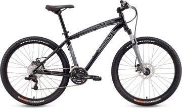 Specialized Hardrock Disc: A black and silver mountain bike with a sleek frame, wide tires, and disc brakes, positioned against a neutral background.