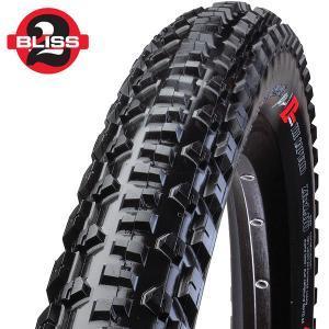 Specialized The Captain Control 2bliss: Close-up view of a mountain bike tire with a rugged tread design, featuring the "Bliss" logo in the top corner. The tire is designed for off-road terrain, showcasing deep grooves for traction and stability.