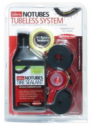 Stans Standard Kit: A packaged tubeless tire system kit by Stan's NoTubes, including a bottle of tire sealant, rim tape, and other installation components. The packaging highlights its eco-friendly features and claims to eliminate flats. Suitable for converting non-tubeless tires and rims for sizes 26" to 29".