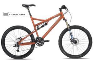 Titus Moto Lite: A mountain bike with an orange frame, featuring front suspension, chunky tires, and a single chainring setup. The bike is positioned at an angle to showcase its design and components.