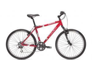 Trek 3700: A red mountain bike with a sturdy frame, front suspension, and thick tires, positioned against a plain white background. The bike features a comfortable seat and handlebar grips, showcasing its design for off-road and recreational use.