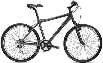Trek 3700: A black mountain bike with a sturdy frame, front suspension, and multiple gears. The bike features wide tires suitable for off-road terrain and a comfortable seat.