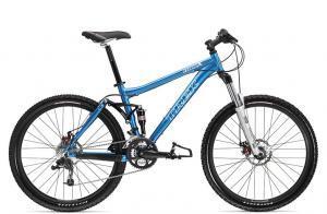 Trek Fuel EX 5: A blue mountain bike with a sturdy frame, front suspension, and sleek design. The bike has thick tires suitable for off-road trails and features disc brakes for improved stopping power.