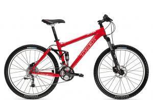 Trek Fuel EX 6: A red mountain bike with front suspension, wide tires, and disc brakes, positioned at an angle to showcase its frame and components.