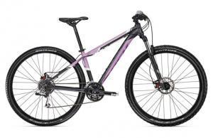 Trek Mamba WSD: A modern mountain bike with a black and purple frame, featuring wide tires, disc brakes, and a lightweight design suitable for off-road trails.