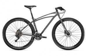 Trek Sawyer: A modern mountain bike with a gray frame, wide tires, and front suspension, designed for off-road use.