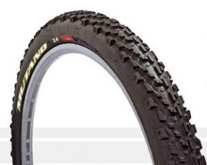 WTB Mutano: A close-up image of a mountain bike tire with a textured tread pattern, designed for off-road cycling. The tire features a dark rubber surface with gray sidewalls and branding on the side.