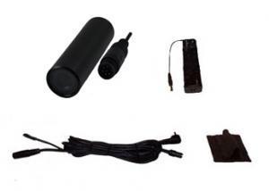 Xtreme Recall CompK: A collection of electronic components including a cylindrical black device, a connector with a wire, a rectangular battery-like object, and a small piece of fabric or material, all on a white background.