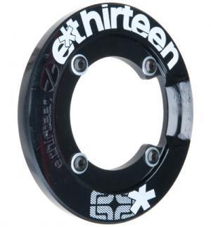e*thirteen SuperCharger: Black chain guide component with the brand name "e*thirteen" printed in white, featuring a circular shape and multiple mounting holes for bike installation.