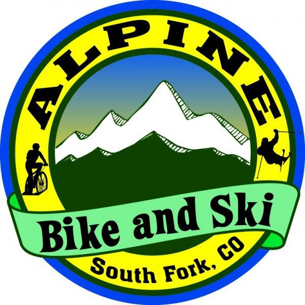 Logo for "Alpine Bike and Ski," featuring a mountain backdrop, a cyclist on the left, and a skier on the right, with the text "South Fork, CO" prominently displayed. The design is circular with vibrant colors.