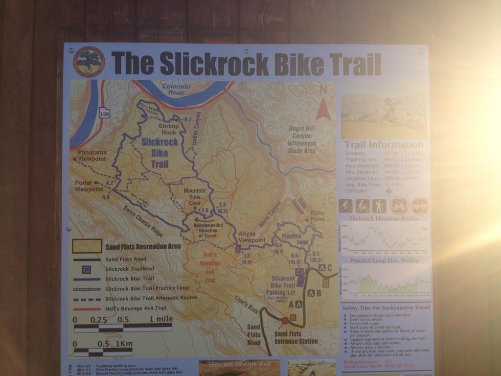 Map of the Slickrock Bike Trail, featuring detailed trail information, elevation profiles, and nearby points of interest in the Sand Flats Recreation Area. Includes marked trails, viewpoints, and safety tips for backcountry travel. Slickrock mountain bike trail.