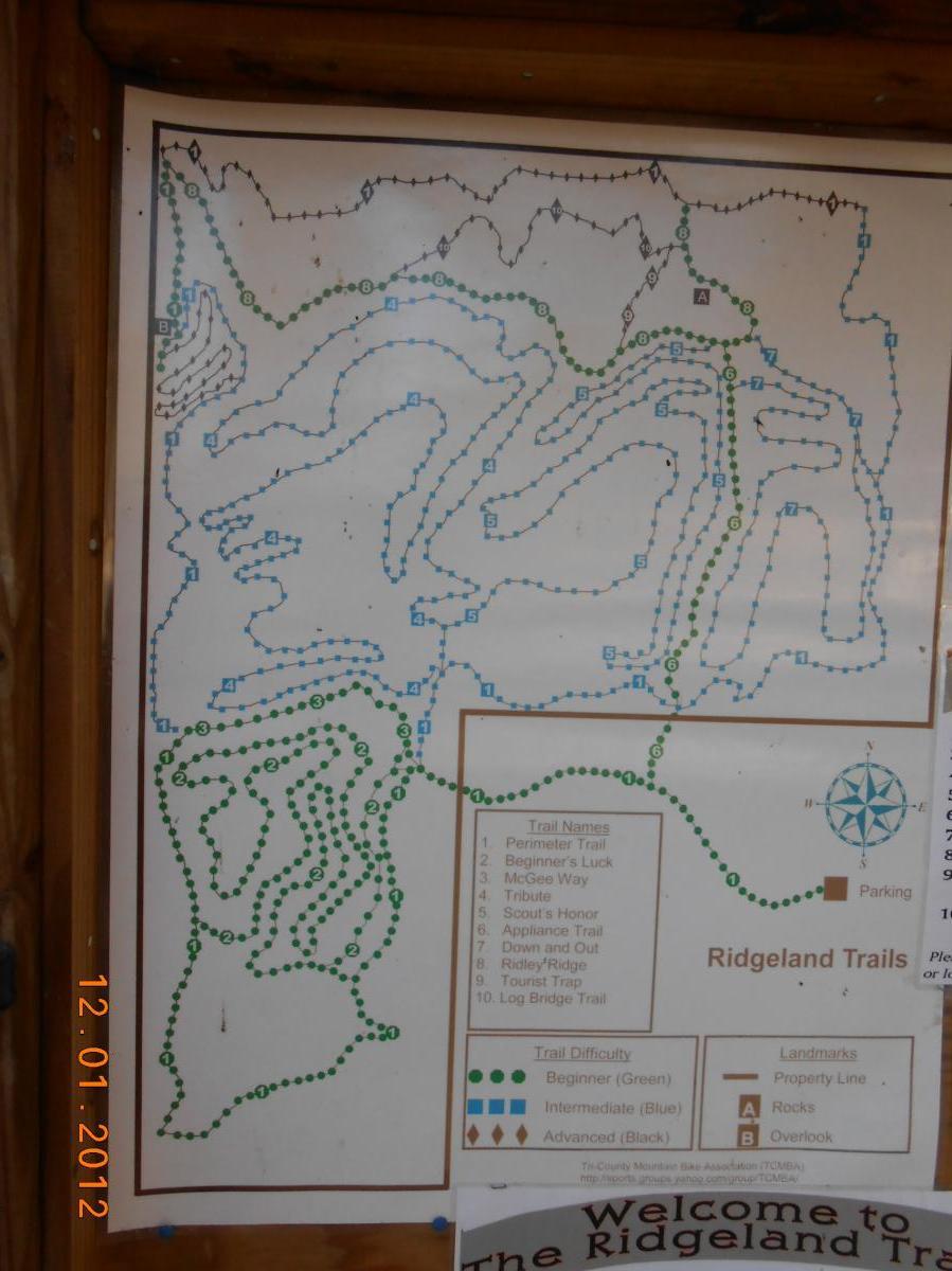 Map of the Ridgeland Trails, displaying various bike trails with their names and difficulty levels. The map includes a legend indicating trail classifications (Beginner, Intermediate, Advanced), landmarks like parking and overlooks, and marked paths for trails such as Perimeter Trail, Beginner's Luck, and more. The date at the bottom shows it was taken on December 1, 2012. The Ridgeland Trails mountain bike trail.
