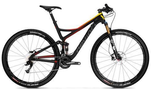 Devinci Atlas: A modern mountain bike featuring a sleek black frame with red and yellow accents, equipped with wide tires and front suspension, ideal for off-road cycling.