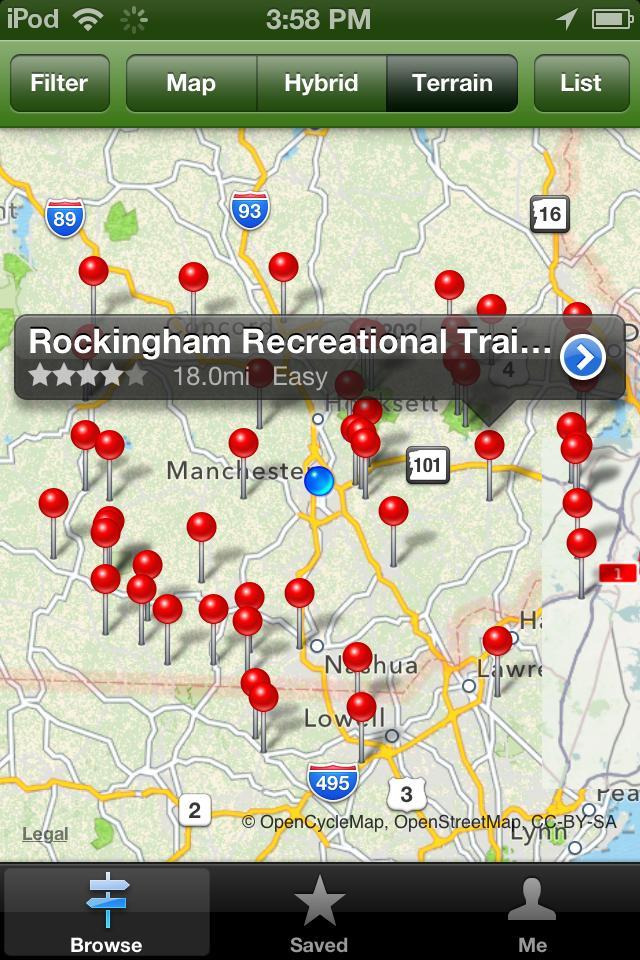 National Geographic All Trails: Map displaying the Rockingham Recreational Trail in New Hampshire, featuring various trailheads marked with red pins. The map includes adjoining towns such as Manchester, Nashua, and Lowell, and highlights an 18-mile easy trail. Navigation options are visible at the top of the image.