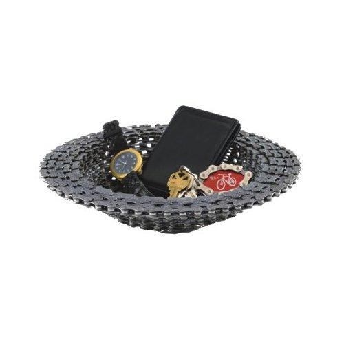 Resource Revival Resource Revival Bike Chain Bowl: A round bowl made from bicycle chain, containing a black wallet, a gold and black wristwatch, a keychain with a bicycle emblem, and a few keys.
