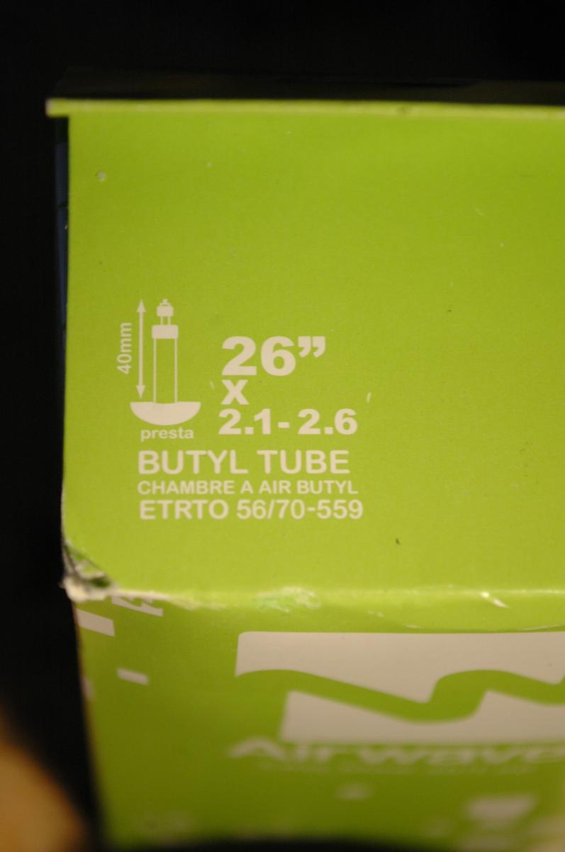 Airwave MTB Tube: Image of a green box containing a butyl bicycle tube, labeled with specifications: "26” x 2.1-2.6," a presta valve illustration, and "ETRTO 56/70-559."