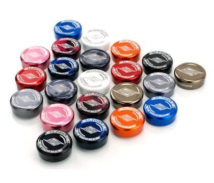 STRAITLINE Bar Caps: A collection of colorful bottle caps in various shades including blue, red, pink, white, black, silver, and gold, arranged on a white background.