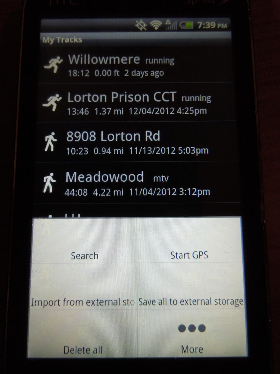 MyTracks: Screenshot of a mobile application displaying running track information, including location names (Willowmere, Lorton Prison CCT, 8908 Lorton Rd, Meadowwood), durations, distances, and timestamps. The interface shows buttons for searching, starting GPS, importing data, saving data, and more options.