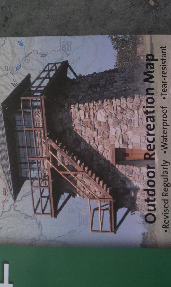National Geographic Trails Illustrated #791 Staunton Shenandoah Mountain: Alt text: "An outdoor recreation map featuring a stone lookout tower with wooden stairs leading up to it, set against a background of topographical details."