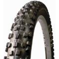 Kenda Kinetics: Close-up view of a rugged, patterned mountain bike tire, showcasing its deep treads designed for traction on rough terrain.
