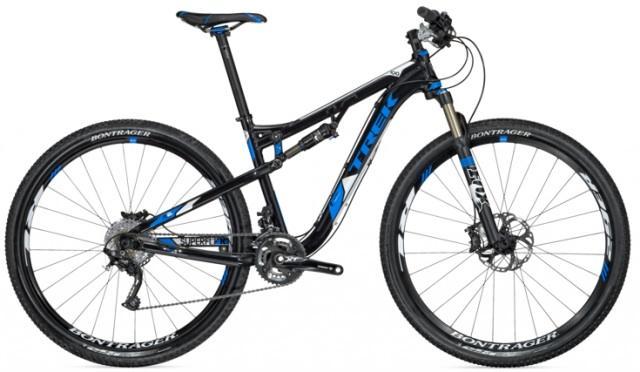 A sleek black and blue mountain bike with a lightweight frame, front suspension, and robust tires designed for off-road biking. The bike features high-performance components suitable for mountain trails.